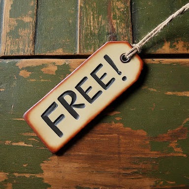"Free" tag on a rustic wood background